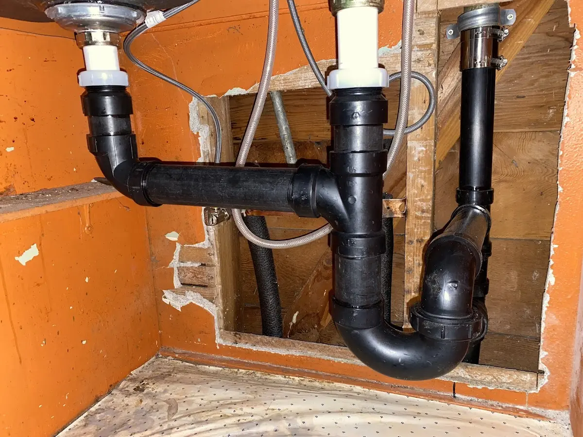 Professional Garbage Disposal Repair equipment and tools on the job in La Grange